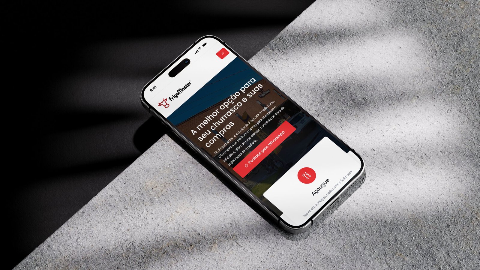 Celular mostrando imagem do site Frigomaster